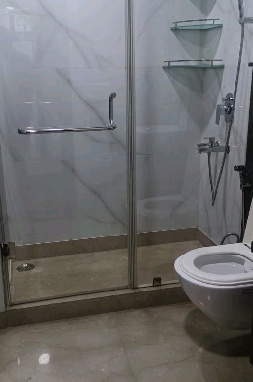 A premium 265 gaj upper ground floor in B1 Block Janakpuri featuring a spacious 4 BHK layout, 4 washrooms, lift, car parking, and solid 6-year-old construction.