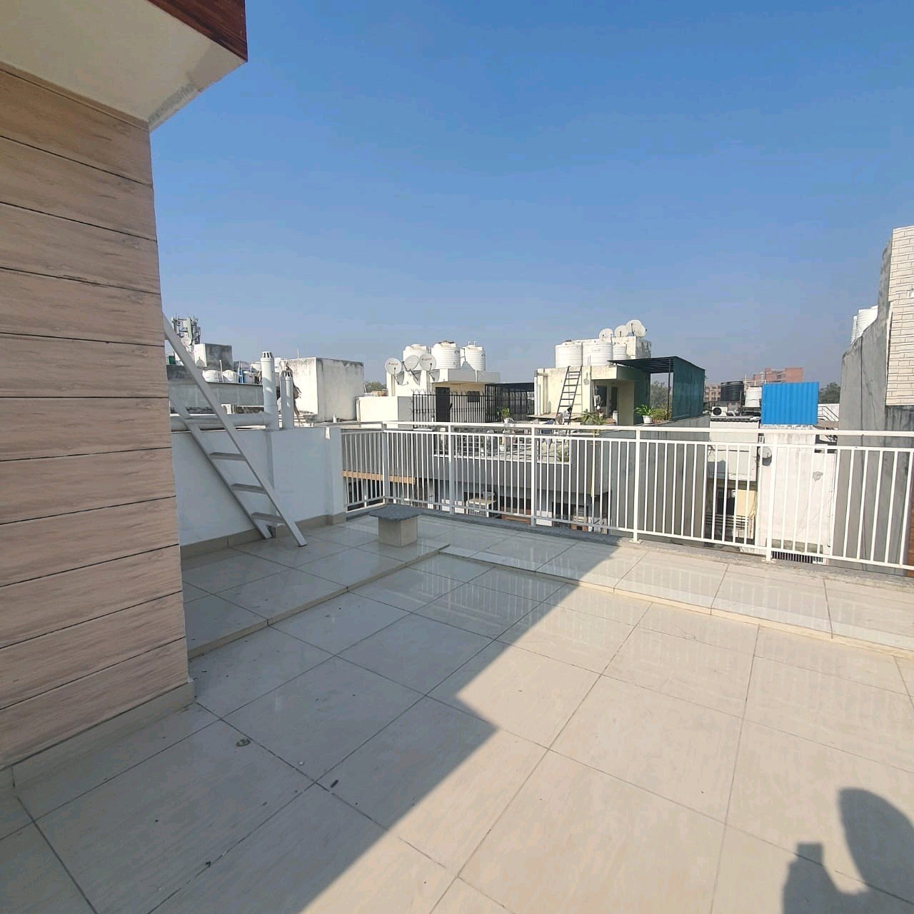 A well-designed 80 gaj top-floor builder floor in C4F Block Janakpuri with roof rights, 2 BHK + 1 room set, ACs fitted, chimney, and corner north-facing advantage.