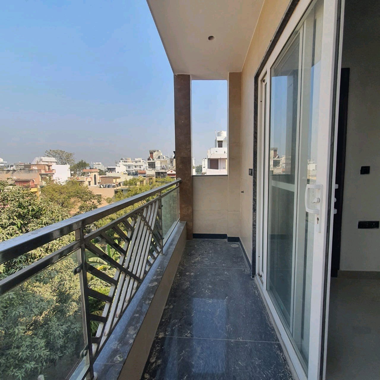 A newly constructed 2 BHK top-floor builder floor in C6B Block Janakpuri featuring 2 washrooms, a roof porta cabin, and an additional roof bathroom.