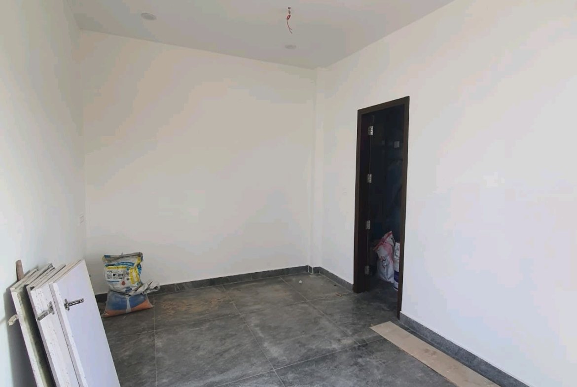 A newly constructed 2 BHK top-floor builder floor in C6B Block Janakpuri featuring 2 washrooms, a roof porta cabin, and an additional roof bathroom.