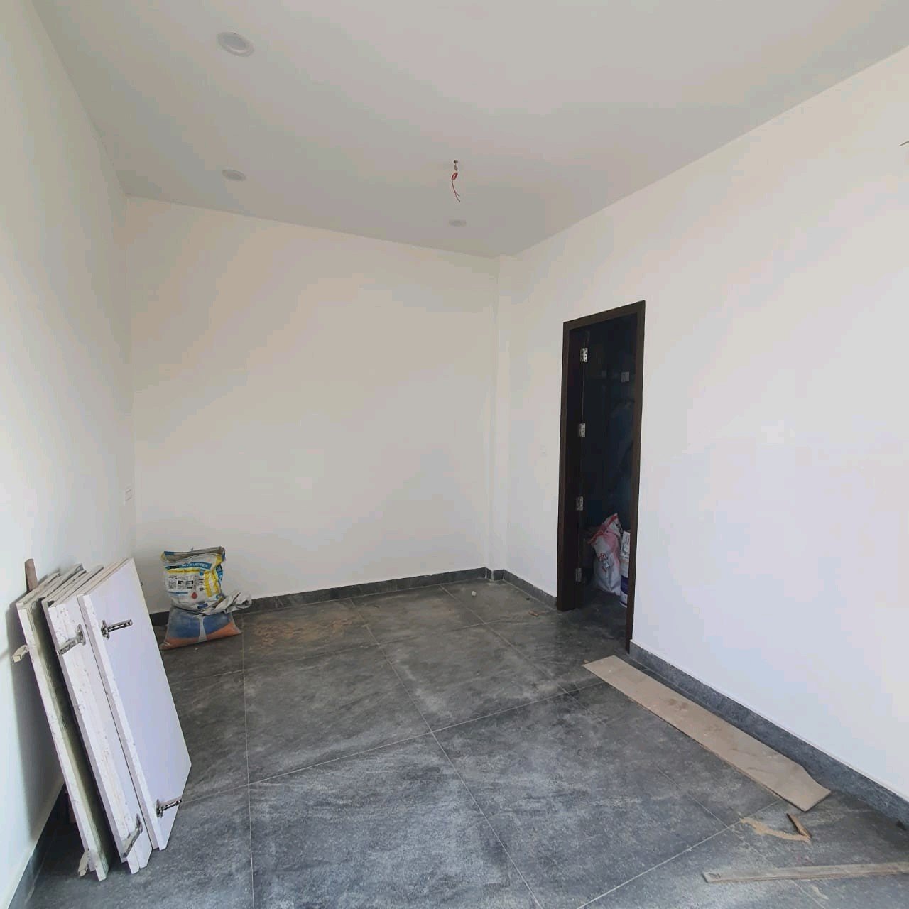 A newly constructed 2 BHK top-floor builder floor in C6B Block Janakpuri featuring 2 washrooms, a roof porta cabin, and an additional roof bathroom.