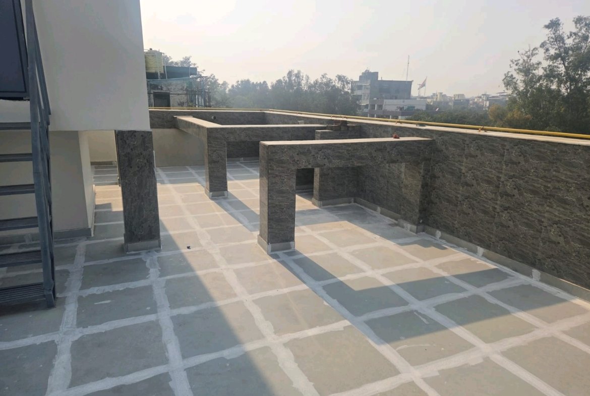 A spacious 419 gaj top-floor builder floor in A2 Block Janakpuri with 50% roof rights, lift, and car parking—ideal for premium living and future expansion.