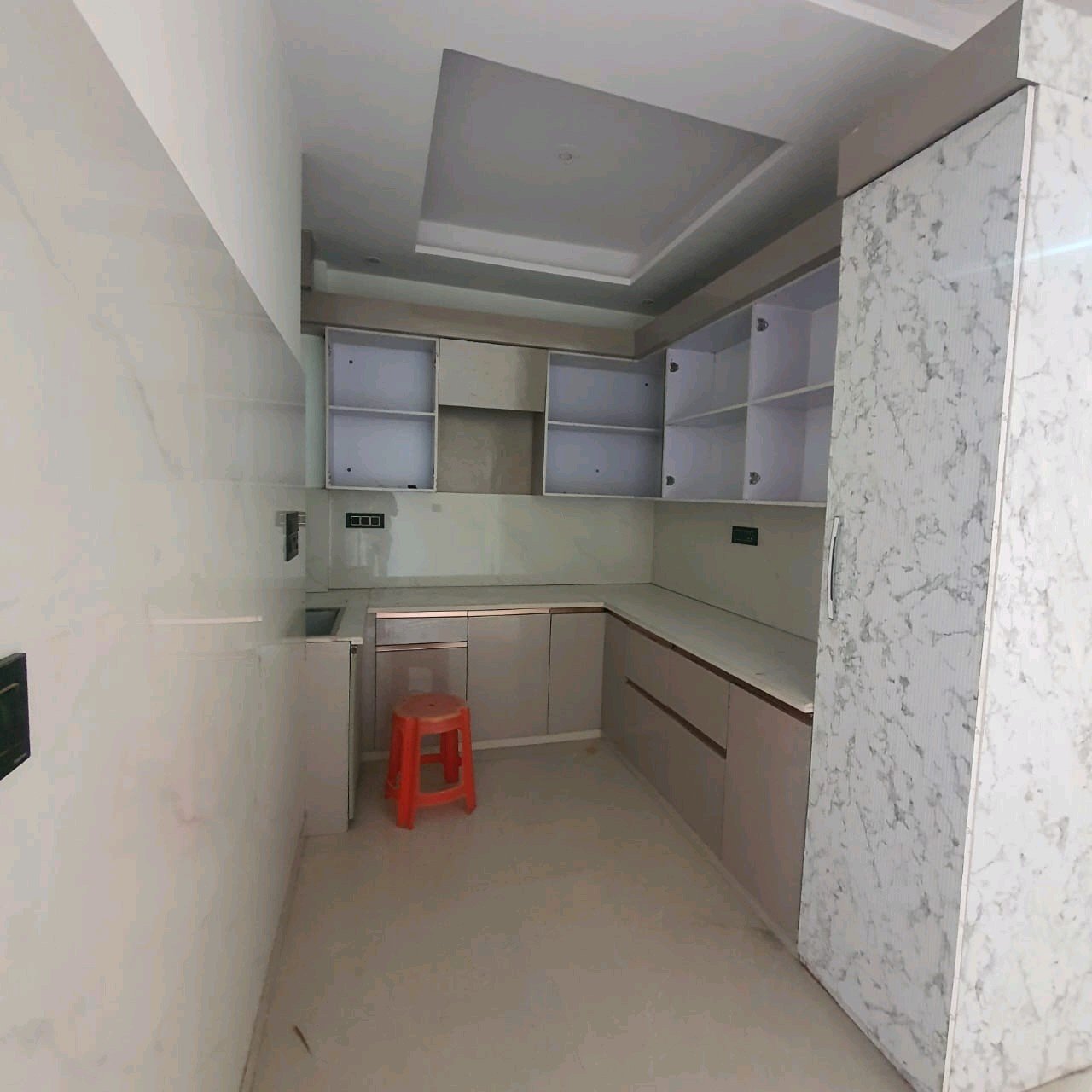 A newly constructed 2 BHK top-floor builder floor in C6B Block Janakpuri featuring 2 washrooms, a roof porta cabin, and an additional roof bathroom.