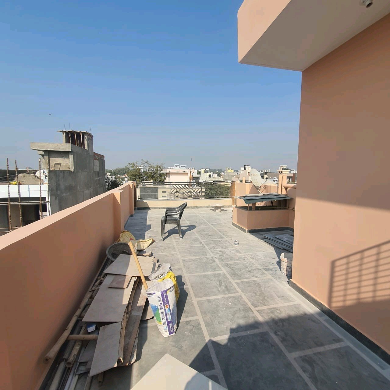 A newly constructed 2 BHK top-floor builder floor in C6B Block Janakpuri featuring 2 washrooms, a roof porta cabin, and an additional roof bathroom.