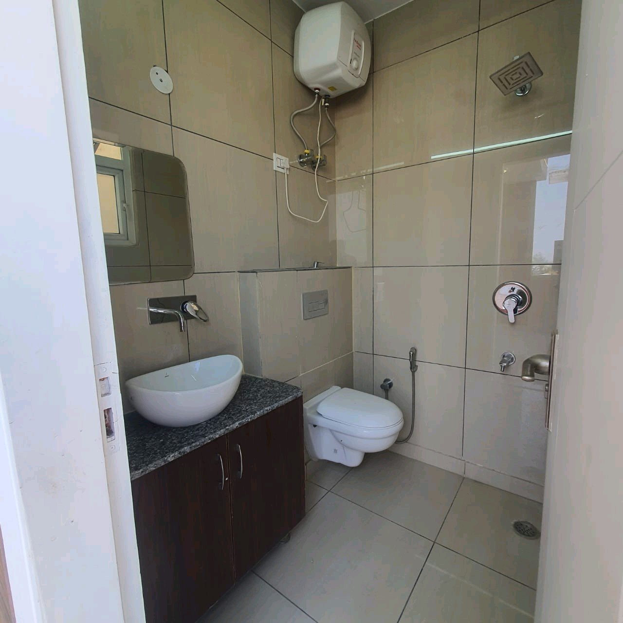 A well-designed 80 gaj top-floor builder floor in C4F Block Janakpuri with roof rights, 2 BHK + 1 room set, ACs fitted, chimney, and corner north-facing advantage.