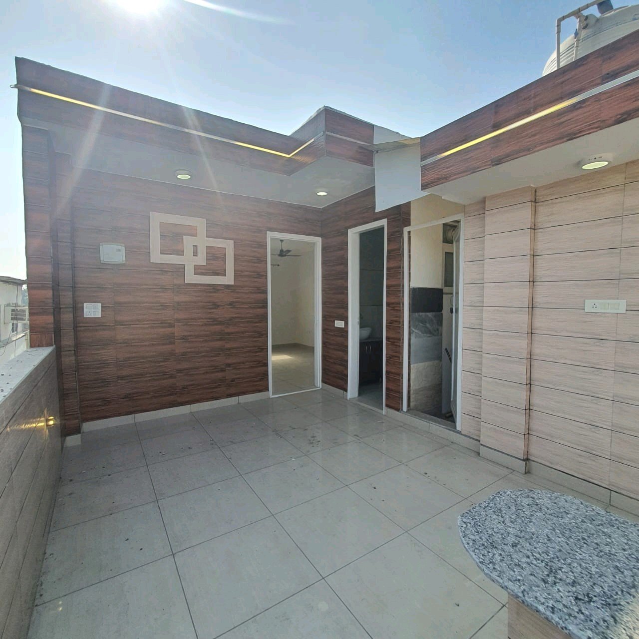 A well-designed 80 gaj top-floor builder floor in C4F Block Janakpuri with roof rights, 2 BHK + 1 room set, ACs fitted, chimney, and corner north-facing advantage.