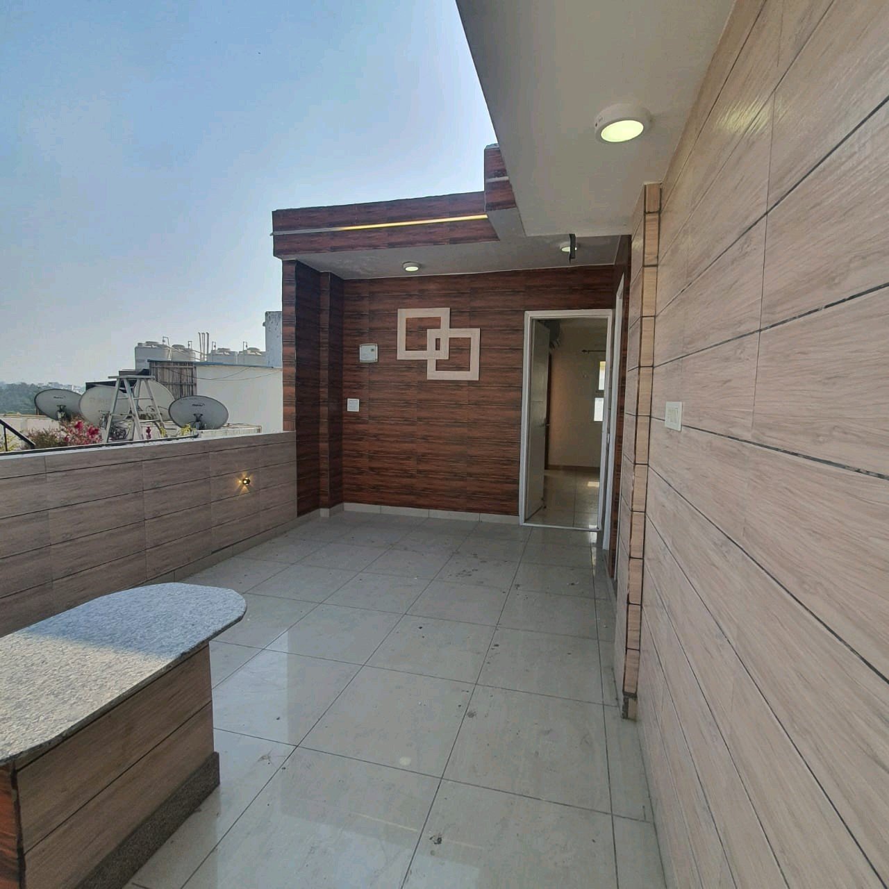 A well-designed 80 gaj top-floor builder floor in C4F Block Janakpuri with roof rights, 2 BHK + 1 room set, ACs fitted, chimney, and corner north-facing advantage.