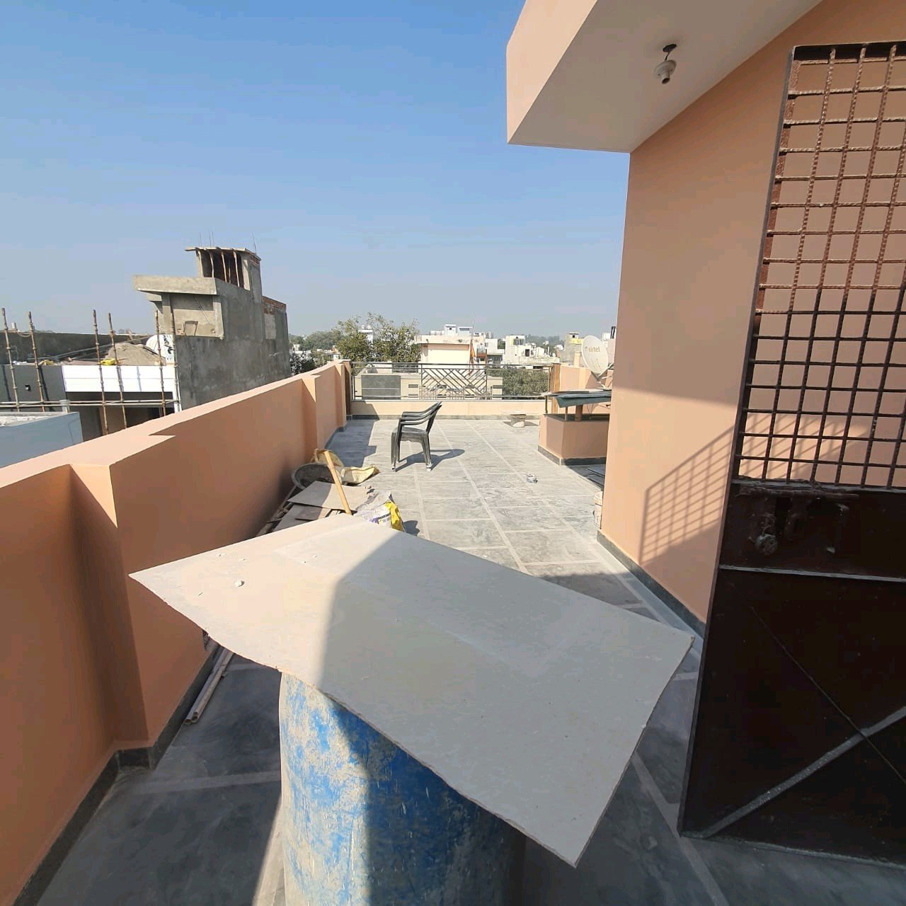 A newly constructed 2 BHK top-floor builder floor in C6B Block Janakpuri featuring 2 washrooms, a roof porta cabin, and an additional roof bathroom.