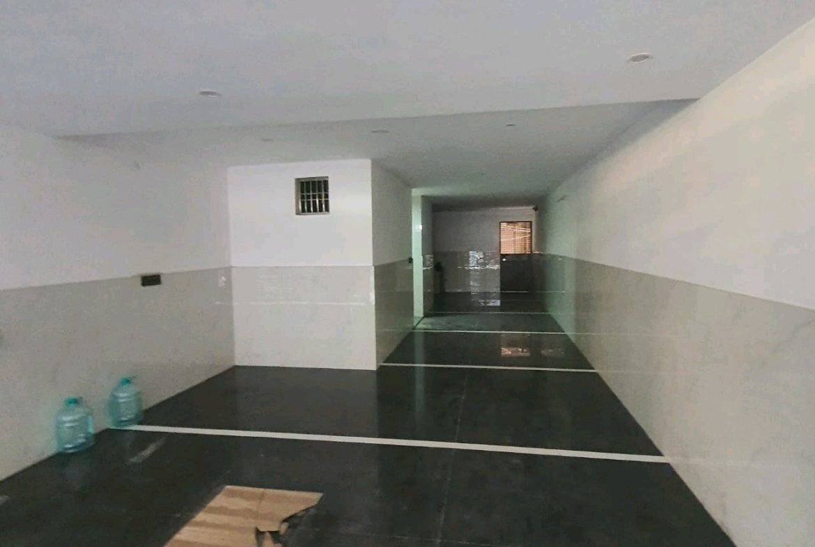 A newly constructed 2 BHK top-floor builder floor in C6B Block Janakpuri featuring 2 washrooms, a roof porta cabin, and an additional roof bathroom.