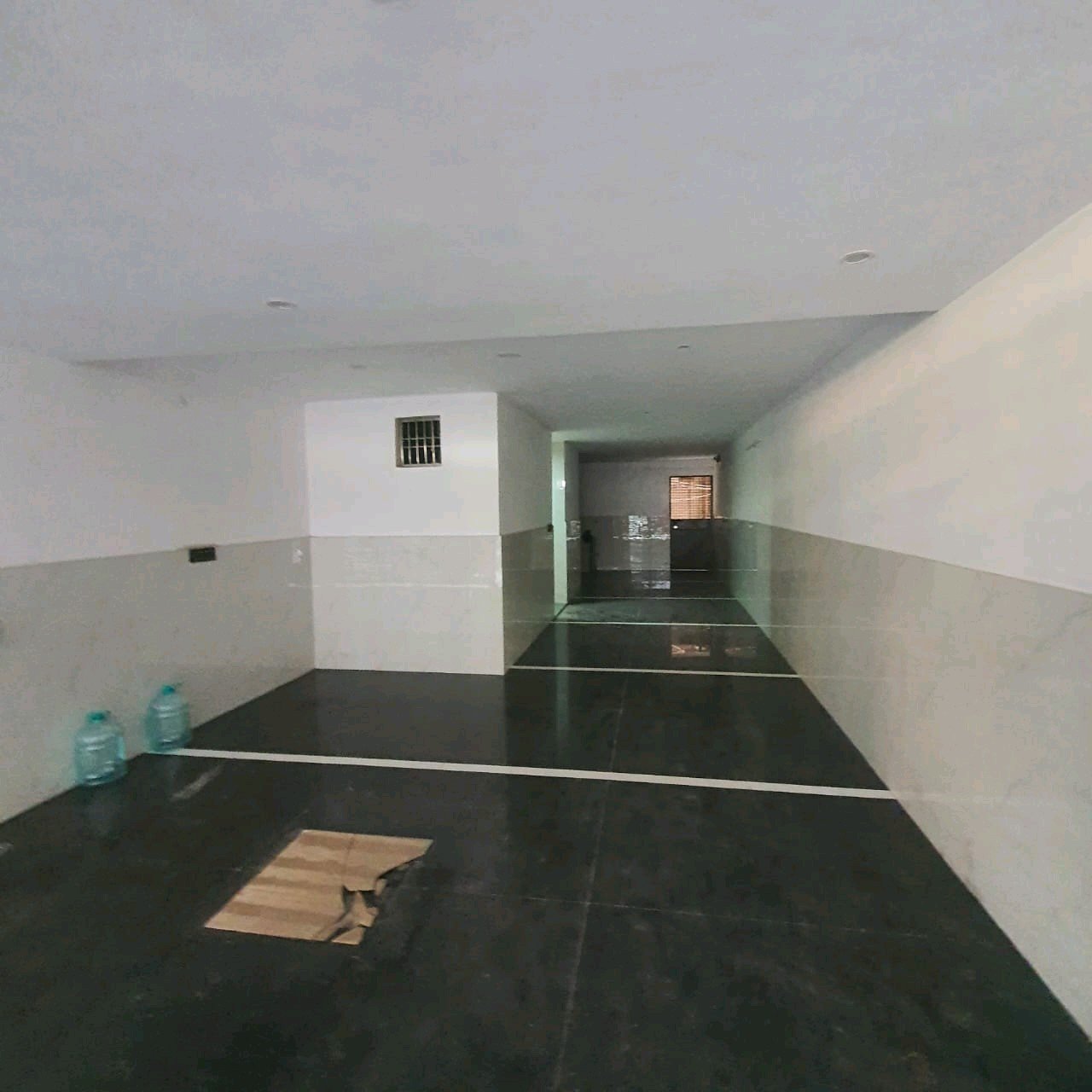 A newly constructed 2 BHK top-floor builder floor in C6B Block Janakpuri featuring 2 washrooms, a roof porta cabin, and an additional roof bathroom.