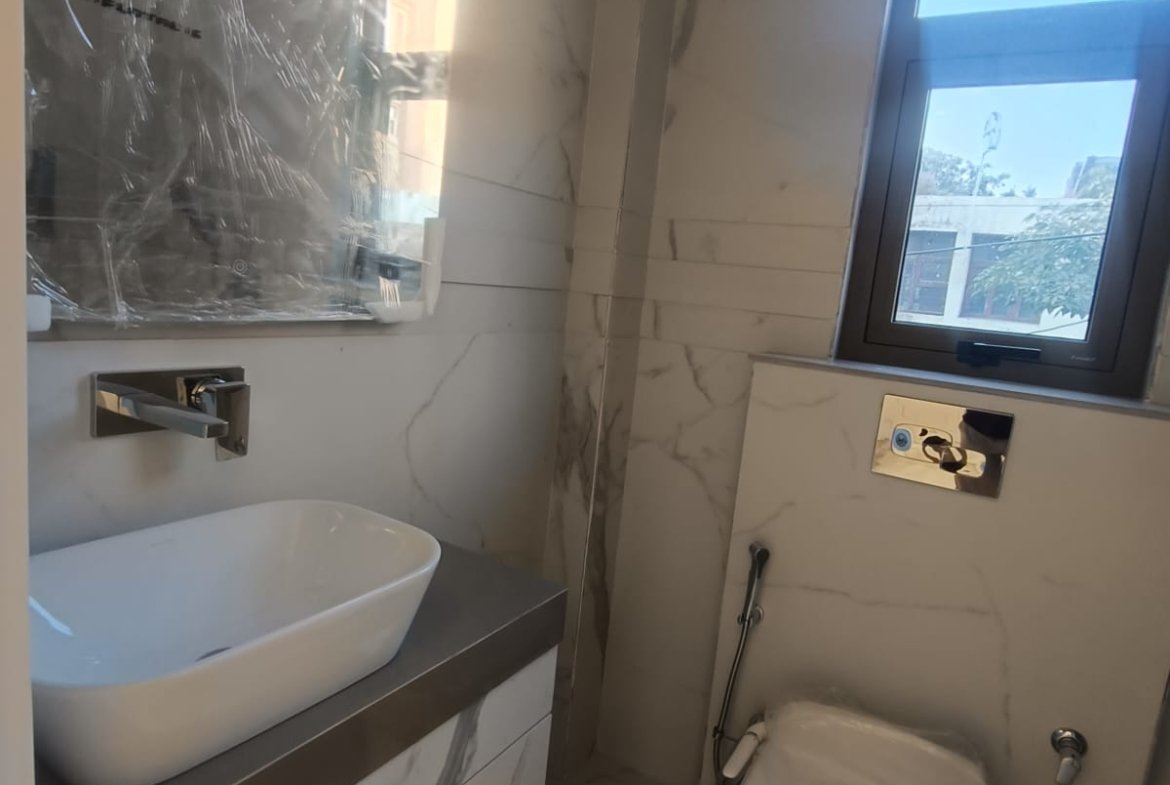 A newly constructed 150 sq yards 3 BHK builder floor on the 2nd floor in C2 Block Janakpuri with lift and stilt car parking.