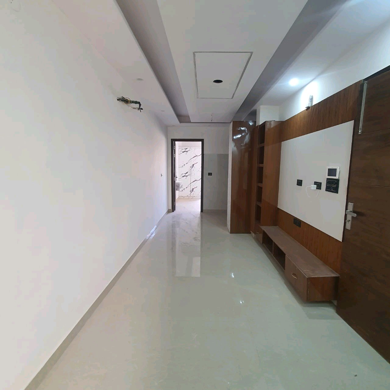 A newly constructed 2 BHK top-floor builder floor in C6B Block Janakpuri featuring 2 washrooms, a roof porta cabin, and an additional roof bathroom.