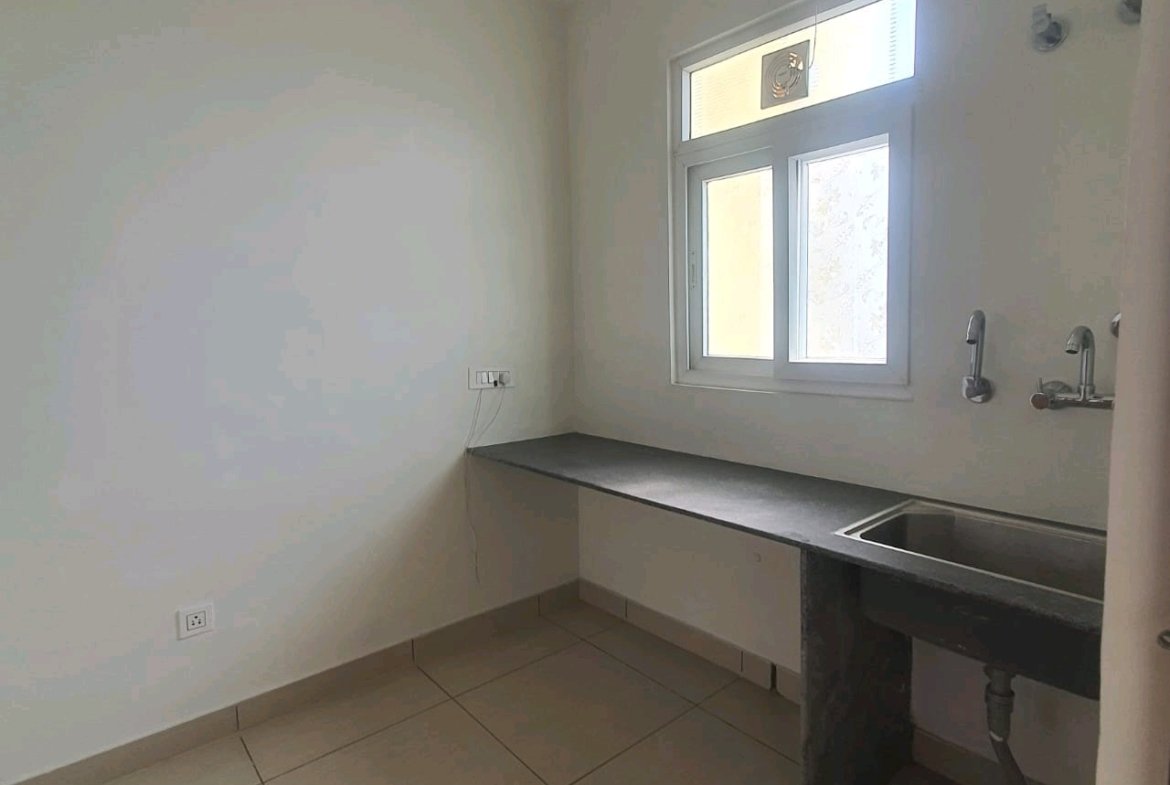 A well-designed 80 gaj top-floor builder floor in C4F Block Janakpuri with roof rights, 2 BHK + 1 room set, ACs fitted, chimney, and corner north-facing advantage.