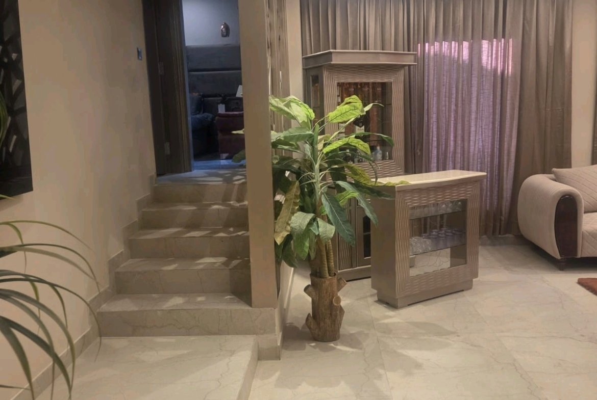 A spacious 419 gaj top-floor builder floor in A2 Block Janakpuri with 50% roof rights, lift, and car parking—ideal for premium living and future expansion.