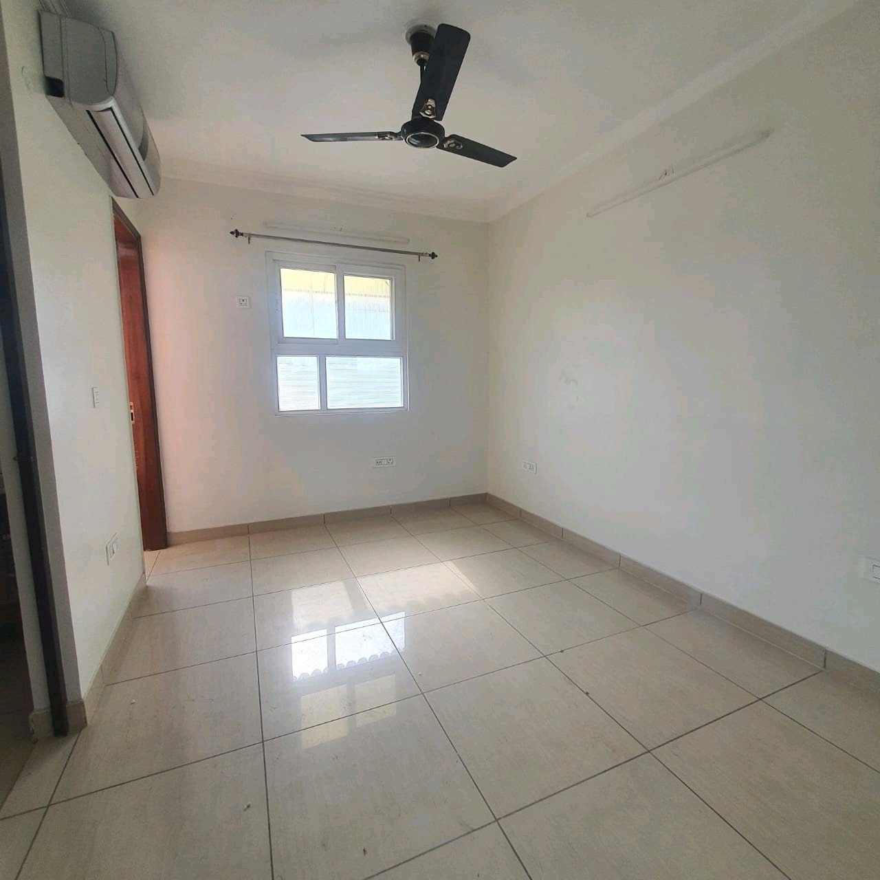 A well-designed 80 gaj top-floor builder floor in C4F Block Janakpuri with roof rights, 2 BHK + 1 room set, ACs fitted, chimney, and corner north-facing advantage.