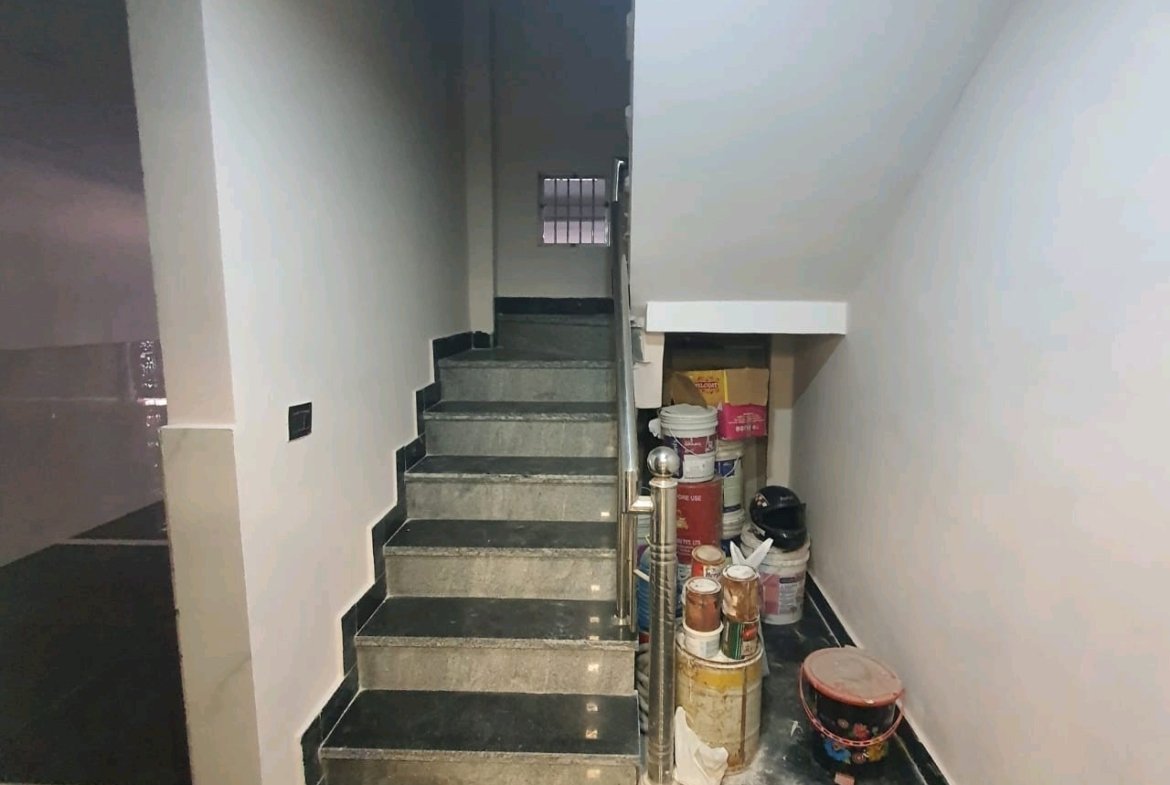 A newly constructed 2 BHK top-floor builder floor in C6B Block Janakpuri featuring 2 washrooms, a roof porta cabin, and an additional roof bathroom.