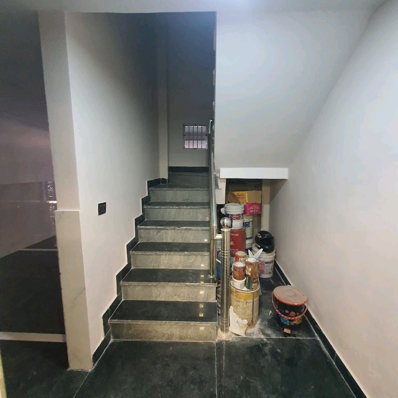A newly constructed 2 BHK top-floor builder floor in C6B Block Janakpuri featuring 2 washrooms, a roof porta cabin, and an additional roof bathroom.